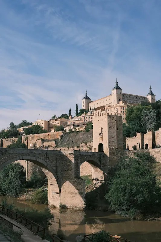 Historic skyline of Toledo with Alcázar and cathedral – medieval Spain